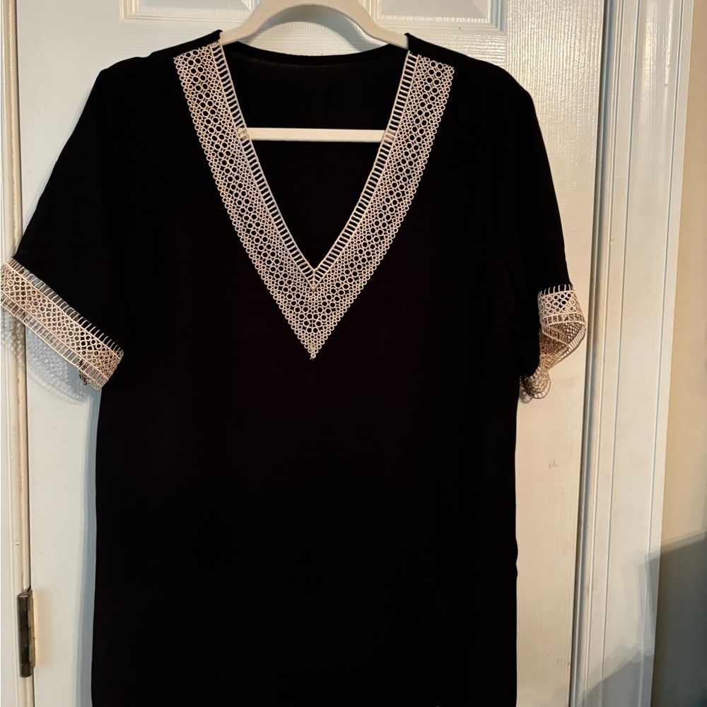 NEW boutique black top with edging